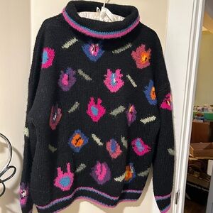 Vintage Dobrila chunky knit black sweater roll neck size large. Very generous.